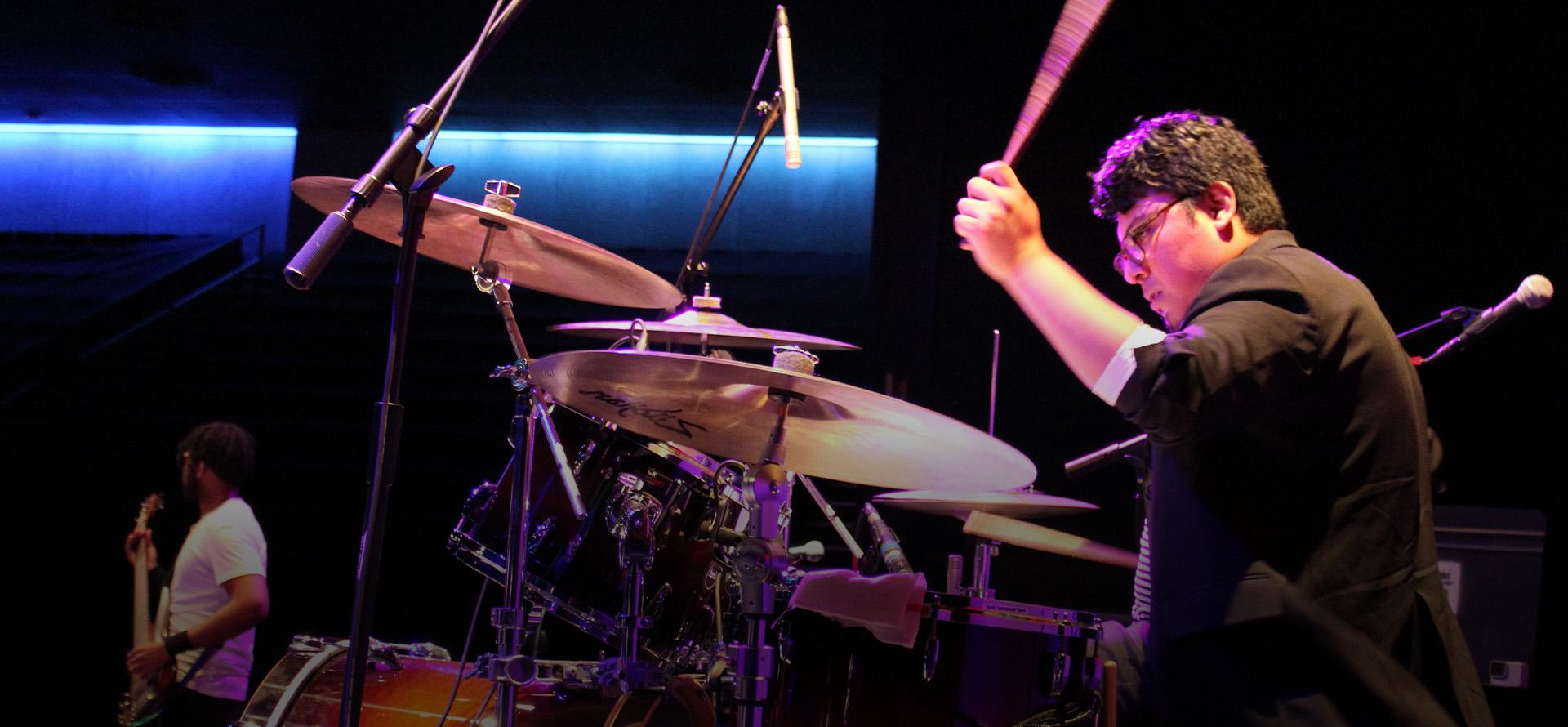 Student playing the drums